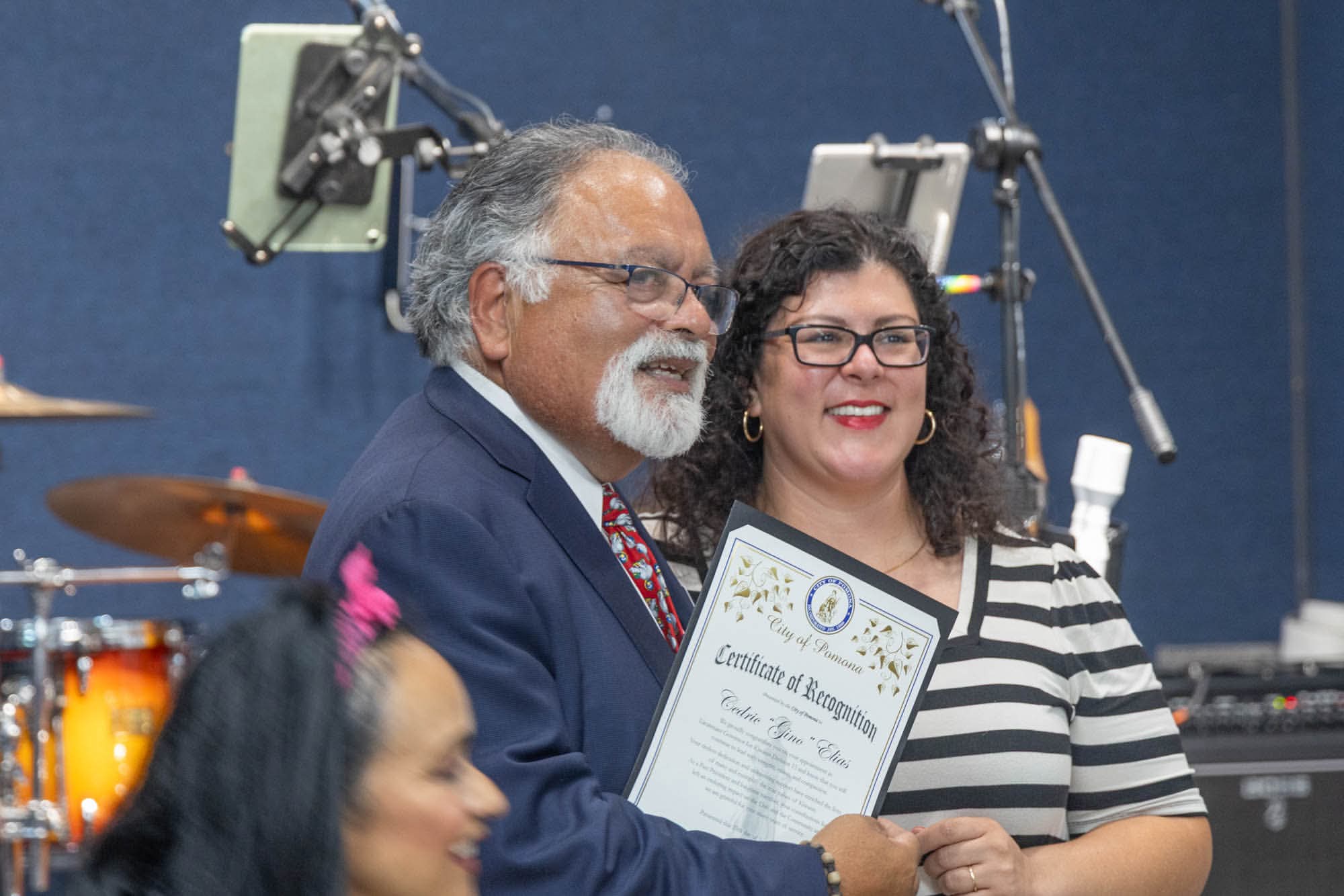 Nora giving a commendation.