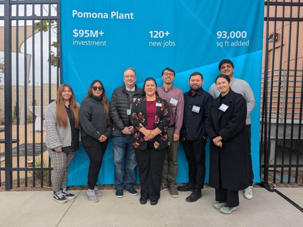 Nora with other city leaders at the Siemens factory grand opening.